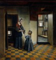 Femme avec un enfant dans un genre de garde manger Pieter de Hooch